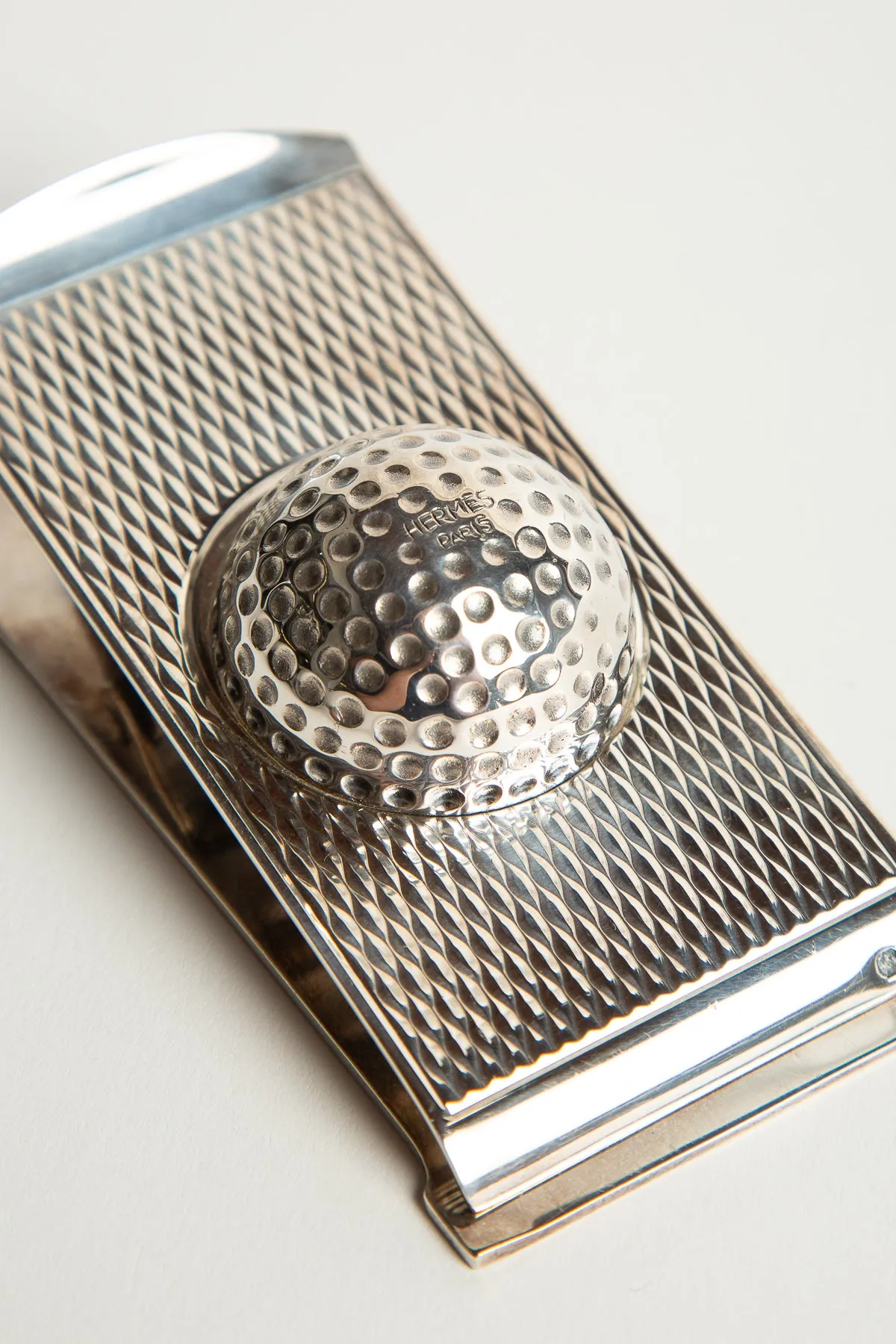 HERMÈS | 1960'S SILVER GOLF BALL PAPER CLIP