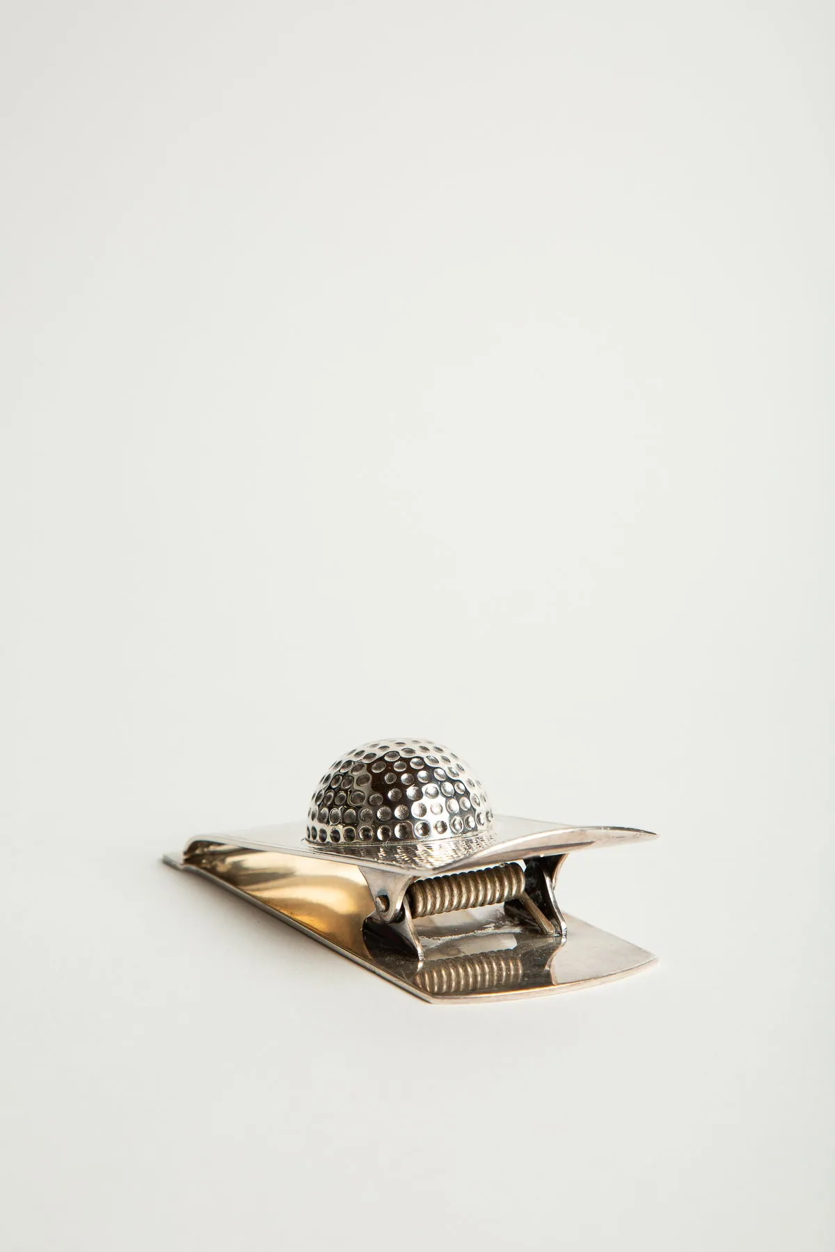 HERMÈS | 1960'S SILVER GOLF BALL PAPER CLIP