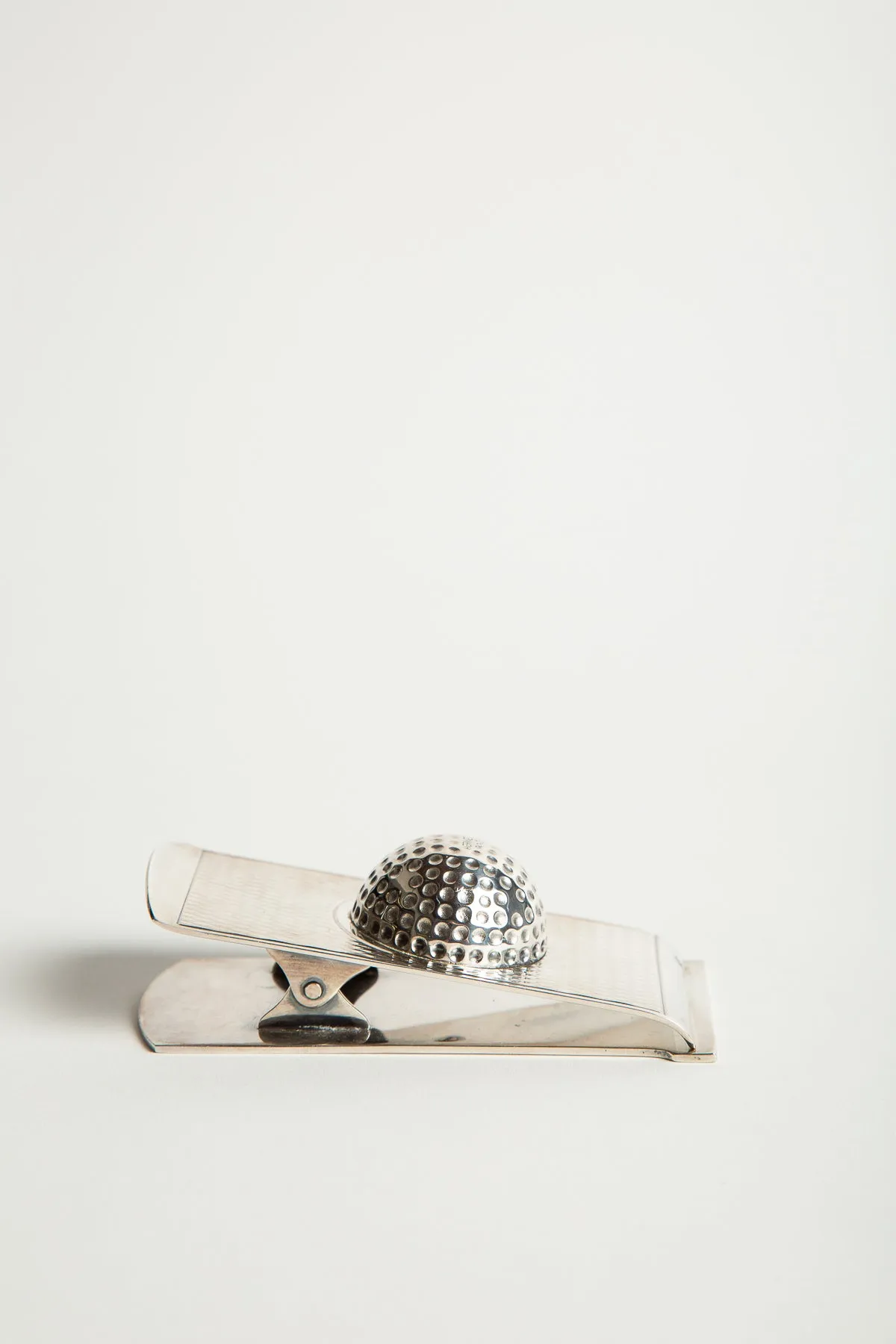 HERMÈS | 1960'S SILVER GOLF BALL PAPER CLIP